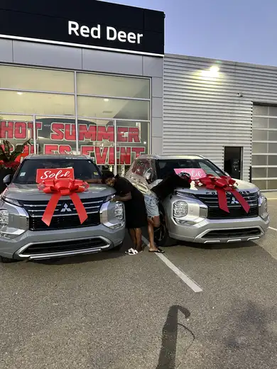 Happy clients on delivery day